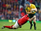 Paul James of Wales tackles David Pocock of Australia during the Rugby World Cup 2015 Pool A match between Australia and Wales at Twickenham Stadium on October 10, 2015