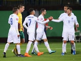 Alex Oxlade-Chamberlain of England (7) celebrates with Adam Lallana (11) as he scores their third goal during the UEFA EURO 2016 qualifying Group E match between Lithuania and England at LFF Stadionas on October 12, 2015