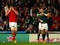 Fourie Du Preez of South Africa is congratulated by Bryan Habana of South Africa for scoring the winning try as Captain Sam Warburton of Wales looks dejected during the 2015 Rugby World Cup Quarter Final match between South Africa and Wales at Twickenham 
