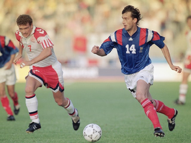 Jean-Philippe Durand of France takes the ball past John Jensen of Denmark during the UEFA European Championships 1992 Group 1 match between France and Denmark held at the Malmo Idrottsplats on June 17, 1992