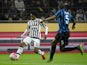 Juventus forward from Colombia Juan Cuadrado (L) fights for the ball with Inter Milan's defender from Brazil Juan Jesus during the Italian Serie A football match Inter Milan vs Juventus on October 18, 2015