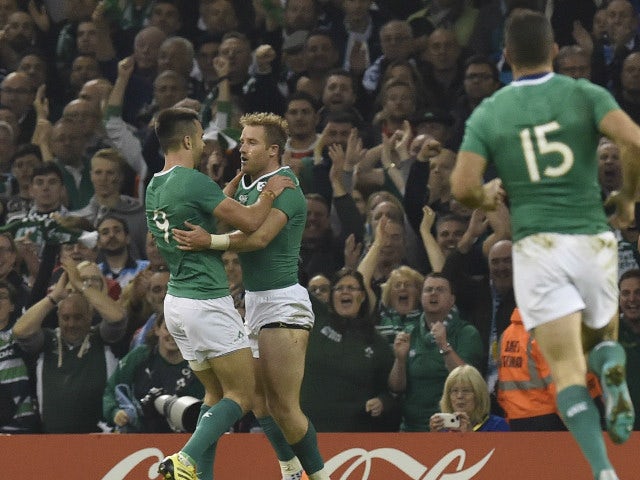 Ireland's wing Luke Fitzgerald (2nd L) celebrates with Ireland's scrum half Conor Murray (L) after scoring his team's first try during a quarter final match of the 2015 Rugby World Cup between Ireland and Argentina at the Millennium Stadium in Cardiff, so