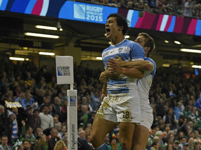 Argentina's centre Matias Moroni (L) celebrates after scoring the first try during a quarter final match of the 2015 Rugby World Cup between Ireland and Argentina at the Millennium Stadium in Cardiff, south Wales, on October 18, 2015.