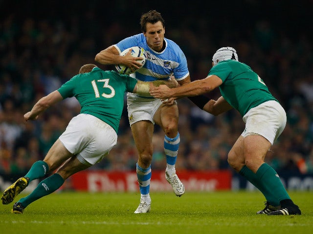 Juan Imhoff of Argentina is tackled by Keith Earls of Ireland during the 2015 Rugby World Cup Quarter Final match between Ireland and Argentina at the Millennium Stadium on October 18, 2015 in Cardiff, United Kingdom.
