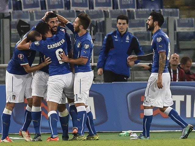 Italy's forward Graziano Pelle (2ndL) celebrates with teammates after scoring during the Euro 2016 qualifying football match between Italy and Norway at Rome's Olympic stadium, on October 13, 2015