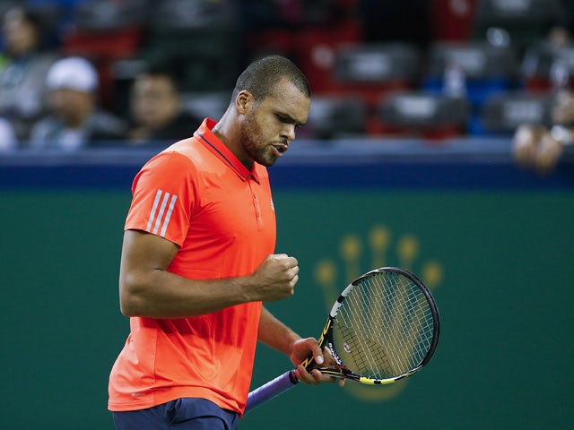 Jo-Wilfried Tsonga of France celebrates a point against Tommy Robredo of Spain during their men's singles first round match on day 2 of Shanghai Rolex Masters at Qi Zhong Tennis Centre on October 12, 2015