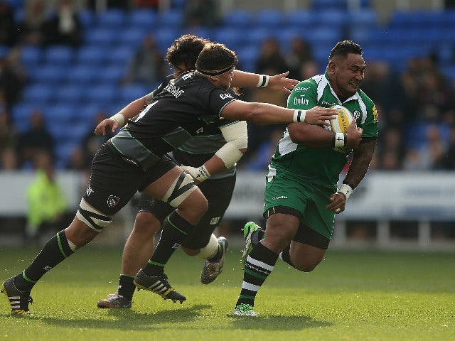 Halani Aulika of London Irish is tackled by Mike Williams of Leicester during the Aviva Premiership match between London Irish and Leicester Tigers at Madejski Stadium on October 18, 2015 in Reading, England. 
