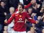 Manchester United's Ruud Van Nistelrooy celebrates scoring a penalty kick against Arsenal during their Premiership football match at Old Trafford, Manchester, United Kingdom, 24 October 2004