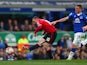 Wayne Rooney of Manchester United scores his team's third goal during the Barclays Premier League match between Everton and Manchester United at Goodison Park on October 17, 2015