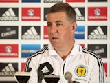 Assistant manager of Scotland Mark McGhee talks to the media during the Scotland Press Conference at Sopwell House ahead of the friendly match against England on August 12, 2013