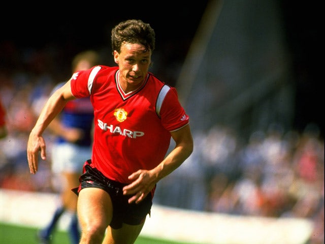 Mike Duxbury of Manchester United in action during a Canon League Division One match against Ipswich Town at Portman Road in Ipswich, England