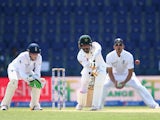 Pakistan batsman Mohammad Hafeez plays a shot on day one of the first Test against England in Abu Dhabi on October 13, 2015