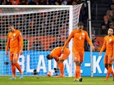 Dutch players react after Czech Republic scored during the Euro 2016 qualifying football match between the Netherlands and Czech Republic in Amsterdam on October 13, 2015