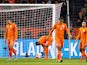 Dutch players react after Czech Republic scored during the Euro 2016 qualifying football match between the Netherlands and Czech Republic in Amsterdam on October 13, 2015