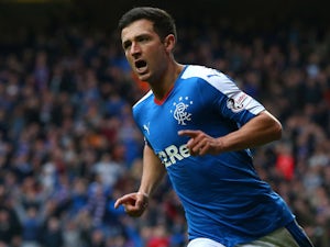 Rangers rout Dumbarton to go clear