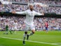 Jese Rodriguez of Real Madrid celebrates after scoring Real's 3rd goal during the La Liga match between Real Madrid CF and Levante UD at estadio Santiago Bernabeu on October 17, 2015