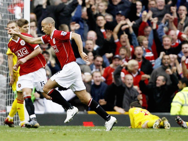 Manchester United's Rio Ferdinand celebrates scoring against Liverpool during their English Premiership soccer match at Old Trafford, Manchester, England, 22 October 2006.