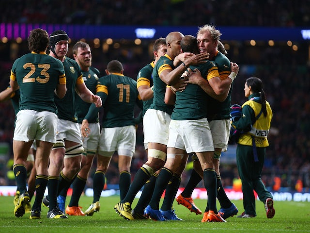 The South Africa team celebrates the try of Fourie Du Preez of South Africa during the 2015 Rugby World Cup Quarter Final match between South Africa and Wales at Twickenham Stadium on October 17, 2015 in London, United Kingdom.