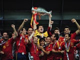 Captain Iker Casillas of Spain lifts the trophy after victory during the UEFA EURO 2012 final match between Spain and Italy at the Olympic Stadium on July 1, 2012
