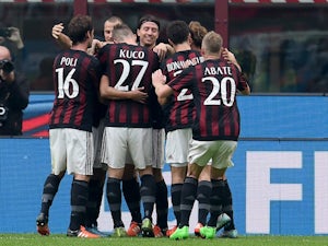 Carlos Bacca of AC Milan (C) celebrate after scoring the opening goal during the Serie A match between AC Milan and US Sassuolo Calcio at Stadio Giuseppe Meazza on October 25, 2015 in Milan, Italy.