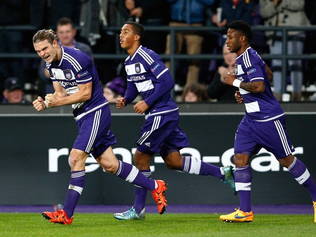 Guillaume Gillet (L) of Anderlecht celebrates after scoring a goal to level the scores at 1-1 during the UEFA Europa League Group J match between RSC Anderlecht and Tottenham Hotspur FC at the Constant Vanden Stock Stadium on October 22, 2015