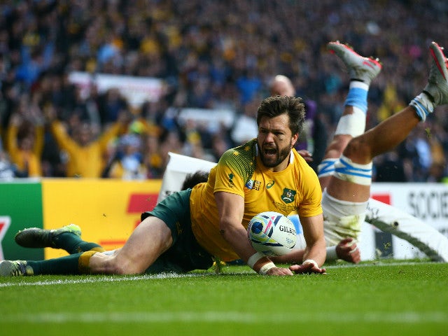 Adam Ashley-Cooper of Australia celebrates after scoring his sides second try during the 2015 Rugby World Cup Semi Final match between Argentina and Australia at Twickenham Stadium on October 25, 2015 in London, United Kingdom.