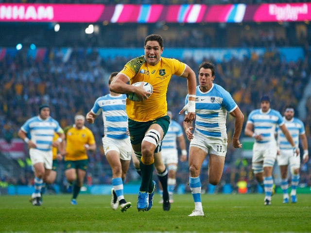 Rob Simmons of Australia races through to score the opening try during the 2015 Rugby World Cup Semi Final match between Argentina and Australia at Twickenham Stadium on October 25, 2015 in London, United Kingdom.