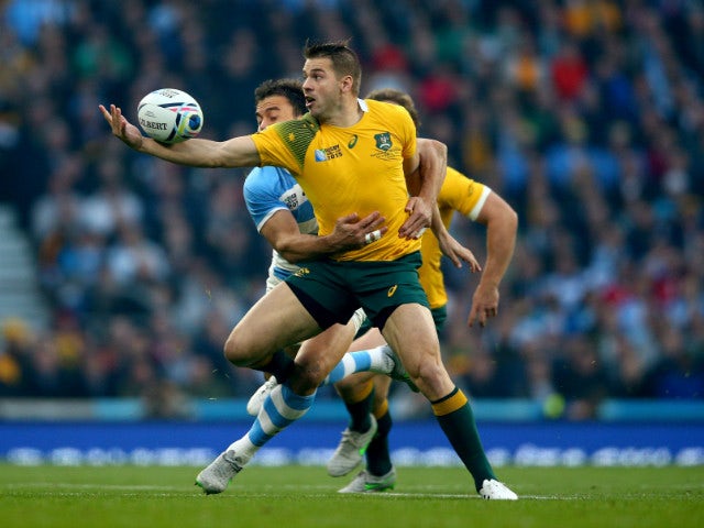 Drew Mitchell of Australia juggles the ball during the 2015 Rugby World Cup Semi Final match between Argentina and Australia at Twickenham Stadium on October 25, 2015 in London, United Kingdom.