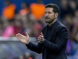Head coach Diego Pablo Simeone of Atletico de Madrid claps during the UEFA Champions League Group C match between Club Atletico de Madrid and FC Astana at Vicente Calderon stadium on October 21, 2015 in Madrid, Spain.