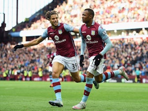Jordan Ayew (R) of Aston Villa celebrates scoring his team's first goal with Rudy Gestede (L) during the Barclays Premier League match between Aston Villa and Swansea City at Villa Park on October 24, 2015