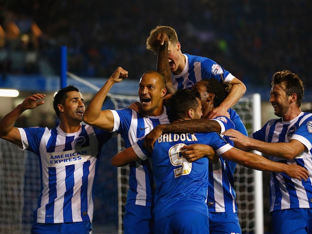 Bobby Zamora of Brighton celebrates with team mates after scoring during the Sky Bet Championship match between Brighton & Hove Albion and Bristol City at Amex Stadium on October 20, 2015 in Brighton, England