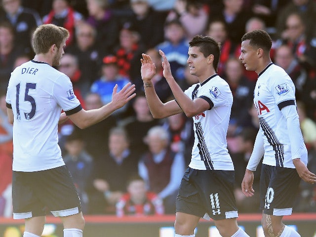 Erik Lamela (C) of Tottenham Hotspur celebrates scoring his team's third goal with his team mates Eric Dier (L) and Dele Alli (R) during the Barclays Premier League match between A.F.C. Bournemouth and Tottenham Hotspur at Vitality Stadium on October 25, 