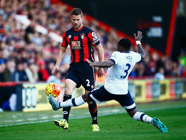 Simon Francis of Bournemouth is challenged by Danny Rose of Tottenham Hotspur during the Barclays Premier League match between A.F.C. Bournemouth and Tottenham Hotspur at Vitality Stadium on October 25, 2015 in Bournemouth, England.