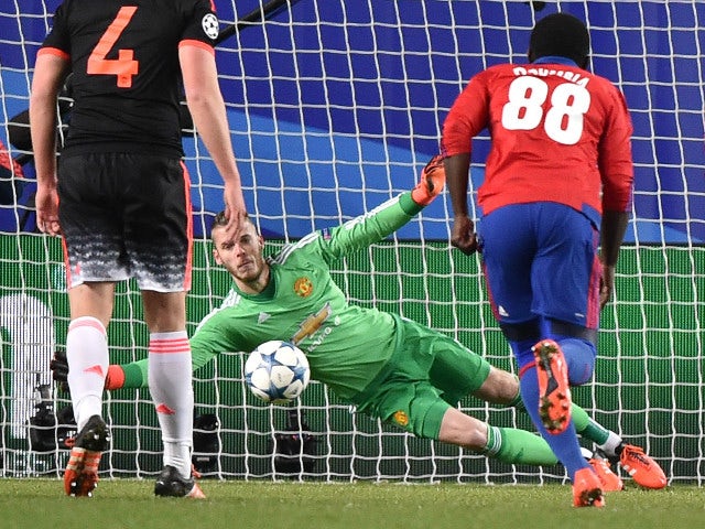 Manchester United's Spanish goalkeeper David De Gea misses to stop a goal during the UEFA Champions League group B football match between PFC CSKA Moscow and FC Manchester United at the Arena Khimki stadium outside Moscow on October 21, 2015.