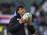 Argentina's head coach Daniel Hourcade holds a ball prior to a semi-final match of the 2015 Rugby World Cup between Argentina and Australia at Twickenham Stadium, southwest London, on October 25, 2015