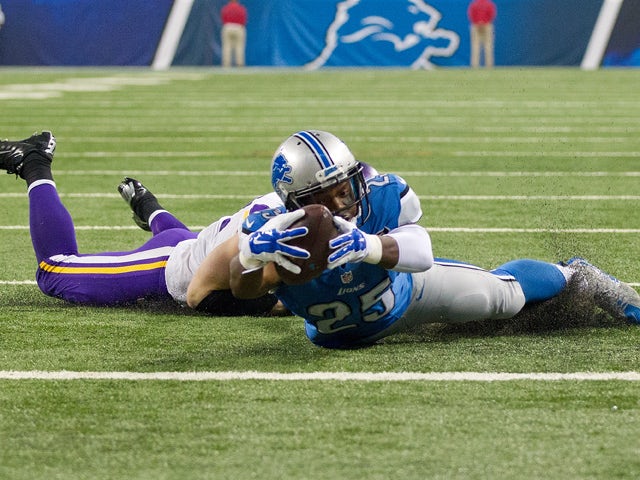 Harrison Smith #22 of the Minnesota Vikings stops Theo Riddick #25 of the Detroit Lions at the goal line during the first quarter at an NFL game at Ford Field on October 25, 2015