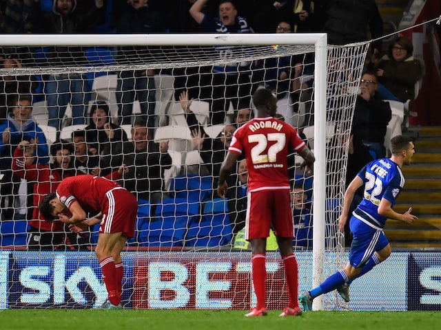 George Friend of Boro (c) reacts after putting the ball into his own net for the first Cardiff goal during the Sky Bet Championship match between Cardiff City and Middlesbrough at Cardiff City Stadium on October 20, 2015 in Cardiff, Wales. 