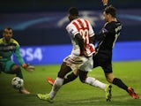 Olympiakos' Nigerian player Ideye Brown (C) shoots to score during the UEFA Champions League football match between Dinamo Zabreb and Olympiakos at the Stadion Maksimir stadium in Zagreb on October 20, 2015.