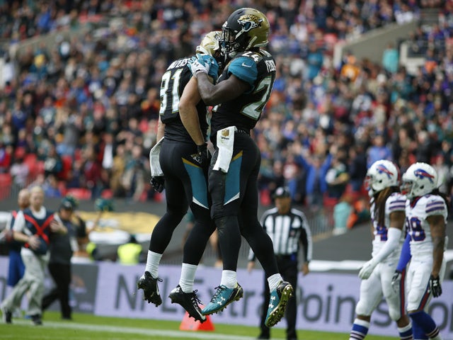 TJ Yeldon #24 of Jacksonville Jaguars celebrates a touchdown during the NFL game between Jacksonville Jaguars and Buffalo Bills at Wembley Stadium on October 25, 2015