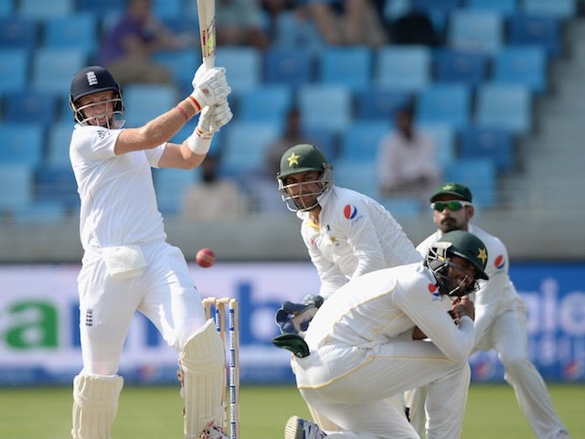 Joe Root of England plays a pull shot on day two of the first Test against Pakistan in Dubai on October 23, 2015