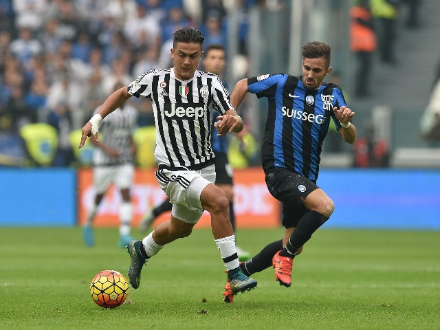 Paulo Dybala (L) of Juventus FC in action against Marco D Alessandro of Atalanta BC during the Serie A match between Juventus FC and Atalanta BC at Juventus Arena on October 25, 2015 in Turin, Italy.