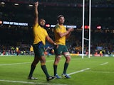 Sekope Kepu and Kane Douglas of Australia celebrate after winning the 2015 Rugby World Cup Semi Final match between Argentina and Australia at Twickenham Stadium on October 25, 2015