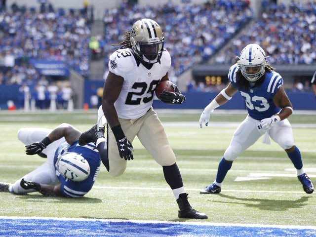 Khiry Robinson #29 of the New Orleans Saints runs in for a touchdown against the Indianapolis Colts at Lucas Oil Stadium on October 25, 2015