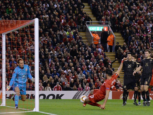 Liverpool's German midfielder Emre Can (C) scores his team's first goal during a UEFA Europa League group B football match between Liverpool FC and FC Rubin Kazan at Anfield in Liverpool, north west England, on October 22, 2015