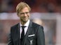 Liverpool's German manager Jurgen Klopp smiles during warm up prior to a UEFA Europa League group B football match between Liverpool FC and FC Rubin Kazan at Anfield in Liverpool, north west England, on October 22, 2015