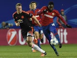 Manchester United's English defender Phil Jones (L) vies for the ball with CSKA Moscow's Nigerian forward Ahmed Musa during the UEFA Champions League group B football match between PFC CSKA Moscow and FC Manchester United at the Arena Khimki stadium outsi
