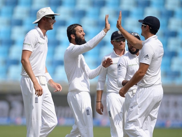 England spinner Moeen Ali celebrates a wicket on day two of the second Test against Pakistan in Dubai on October 23, 2015