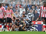 Newcastle players celebrate the first goal by Kevin Nolan during the Barclays Premier League match between Newcastle United and Sunderland at St James' Park on October 31, 2010