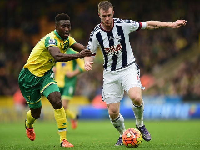 Gary Hooper of Norwich City and Alexander Tettey of Norwich City compete for the ball during the Barclays Premier League match between Norwich City and West Bromwich Albion at Carrow Road on October 24, 2015