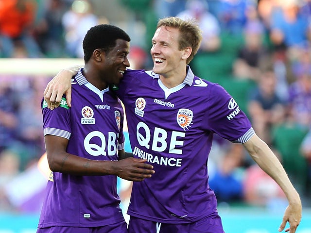 Guyon Fernandez and Michael Thwaite of the Glory celebrate a goal during the round three A-League match between Perth Glory and Adelaide United at nib Stadium on October 25, 2015